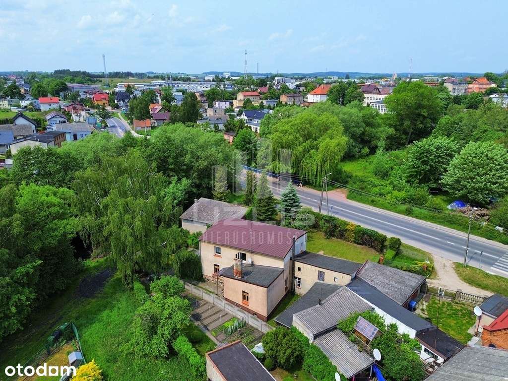 Dom z budynkami gospodarczymi w sercu Skarszew-4