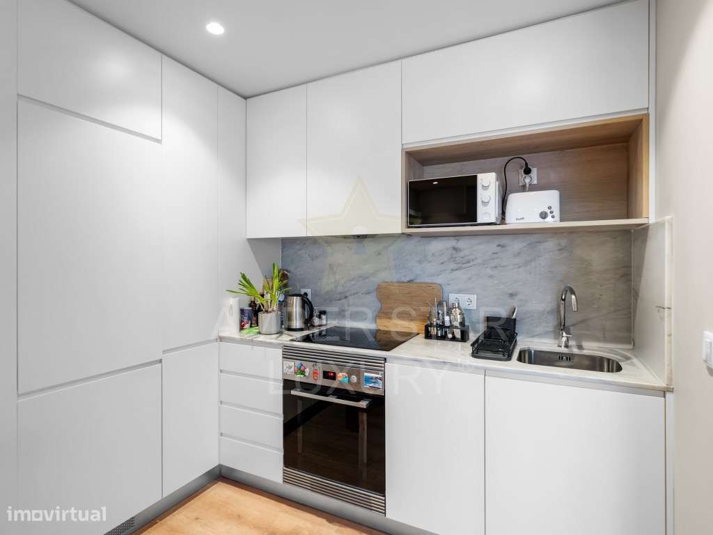 T2 com terraço de 32 m2 em edifício com elevador e garagem em pleno... - Grande imagem: 5/21