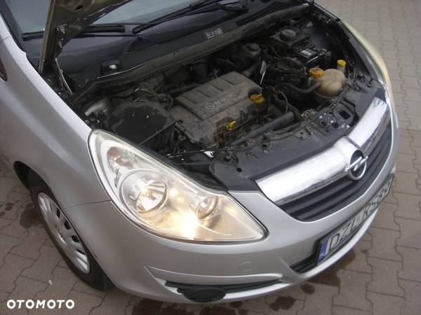 Opel Corsa 1.2 16V Enjoy - 23