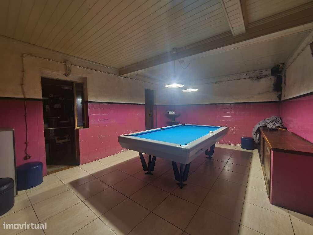 Prédio com T3 com uma loja e garagem em zona de Antanhol - Grande imagem: 4/5