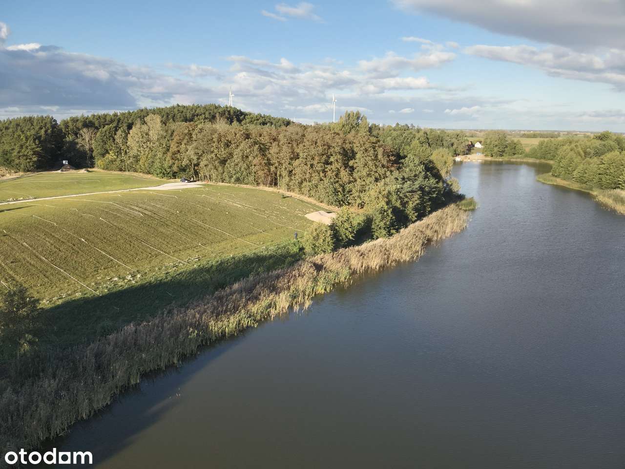 Działka z linią brzegową jeziora - działka budowlana na dom całoroczny