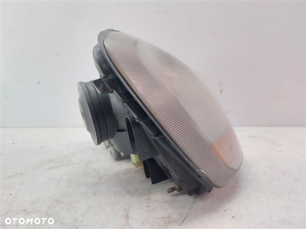 Reflektor lampa przód prawa Nissan Almera Tino 02R - 4
