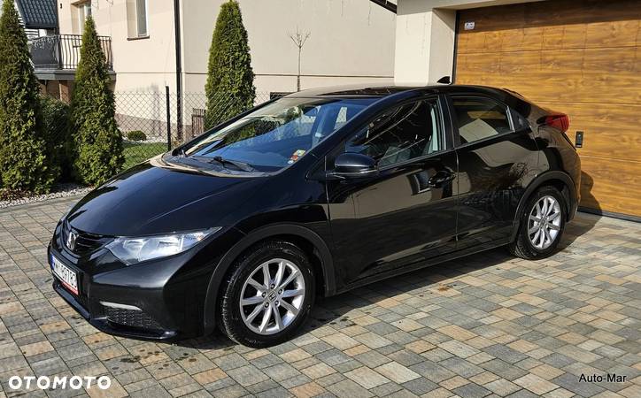 Honda Civic 1.8 i-VTEC Comfort - 26