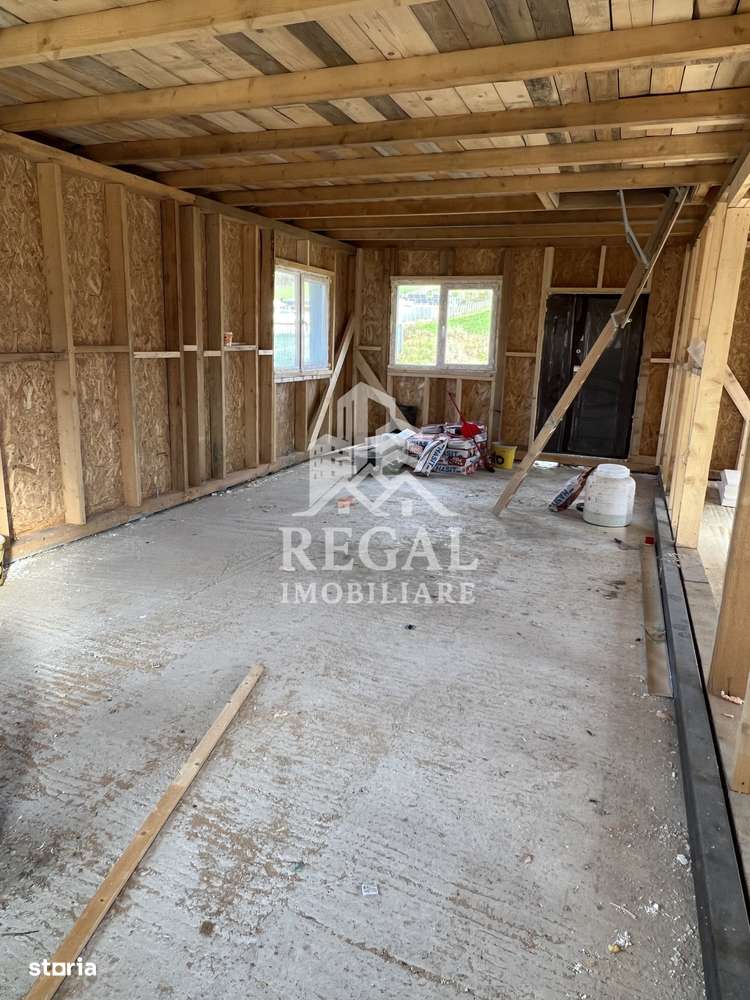 Casă de vânzare în Popești – ideală pentru liniște și aer curat-8