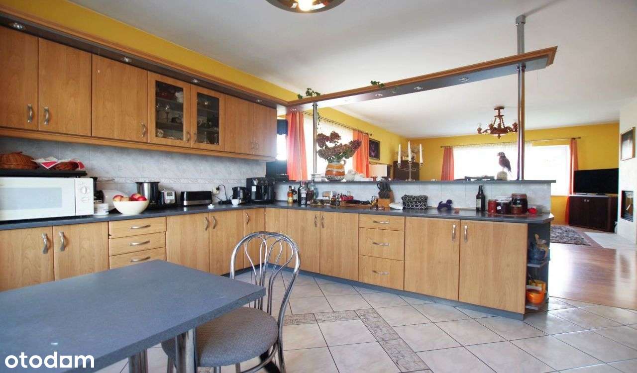 Ekonomiczny urządzony dom z garażem wśród zieleni - Pełny obrazek: 5/12