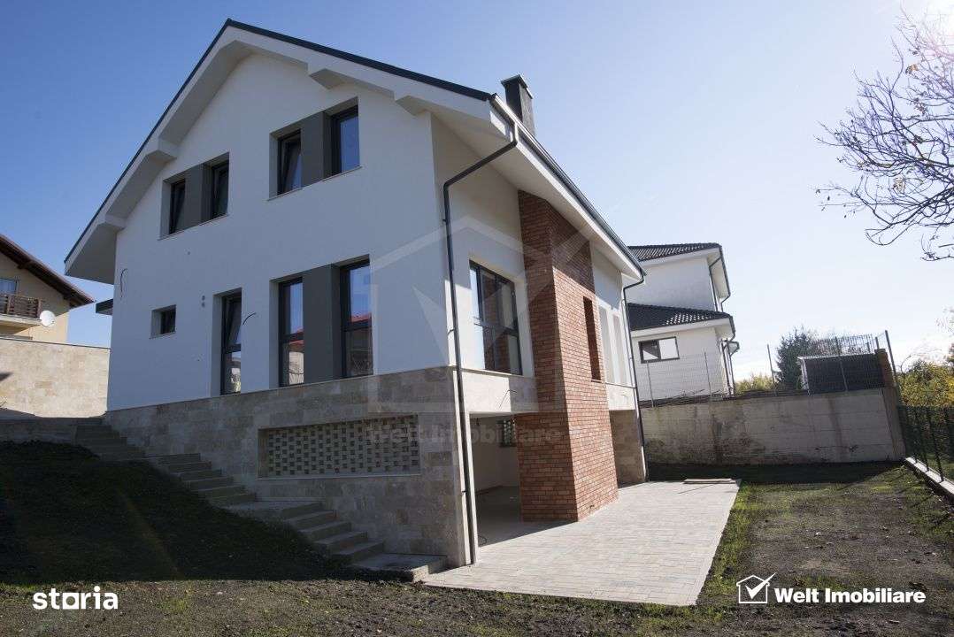 Casa individuala moderna in centrul comunei Chinteni–confort, spatiu - Imagine principală: 2/19