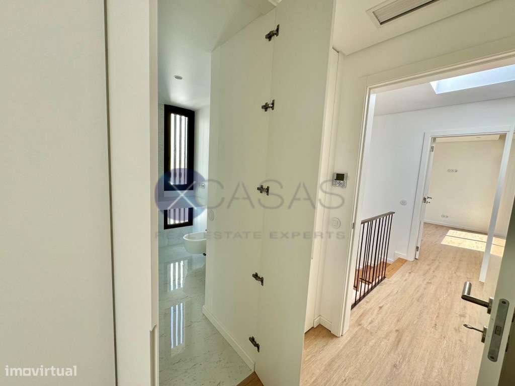 Moradia T3, nova a estrear, situada em Murches.-23