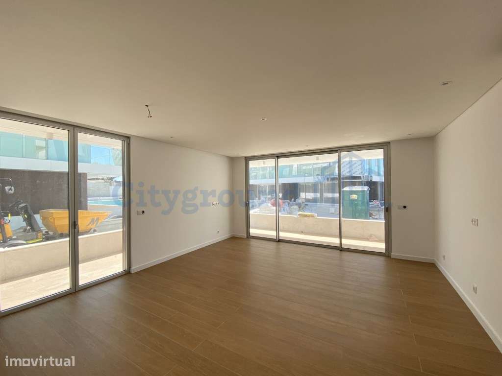 Apartamento T1 com terraço, em condomínio de luxo em frente à praia - Grande imagem: 2/24