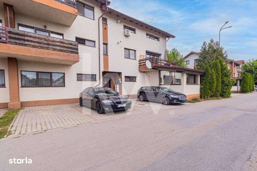 Apartament cu 3 camere, curte proprie si parcare inclusa-1