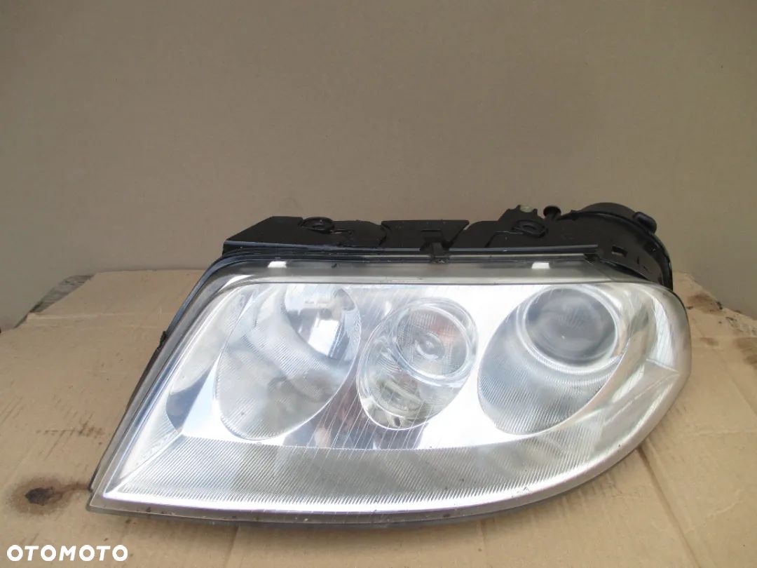 Lampa lewa VW PASSAT B5 LIFT XENON HELLA EUROPA - 1