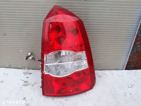 LAMPA TYLNA TYŁ PRAWA CHEVROLET LACETTI NUBIRA III KOMBI ORYGINAŁ WYSYŁKA! - 1