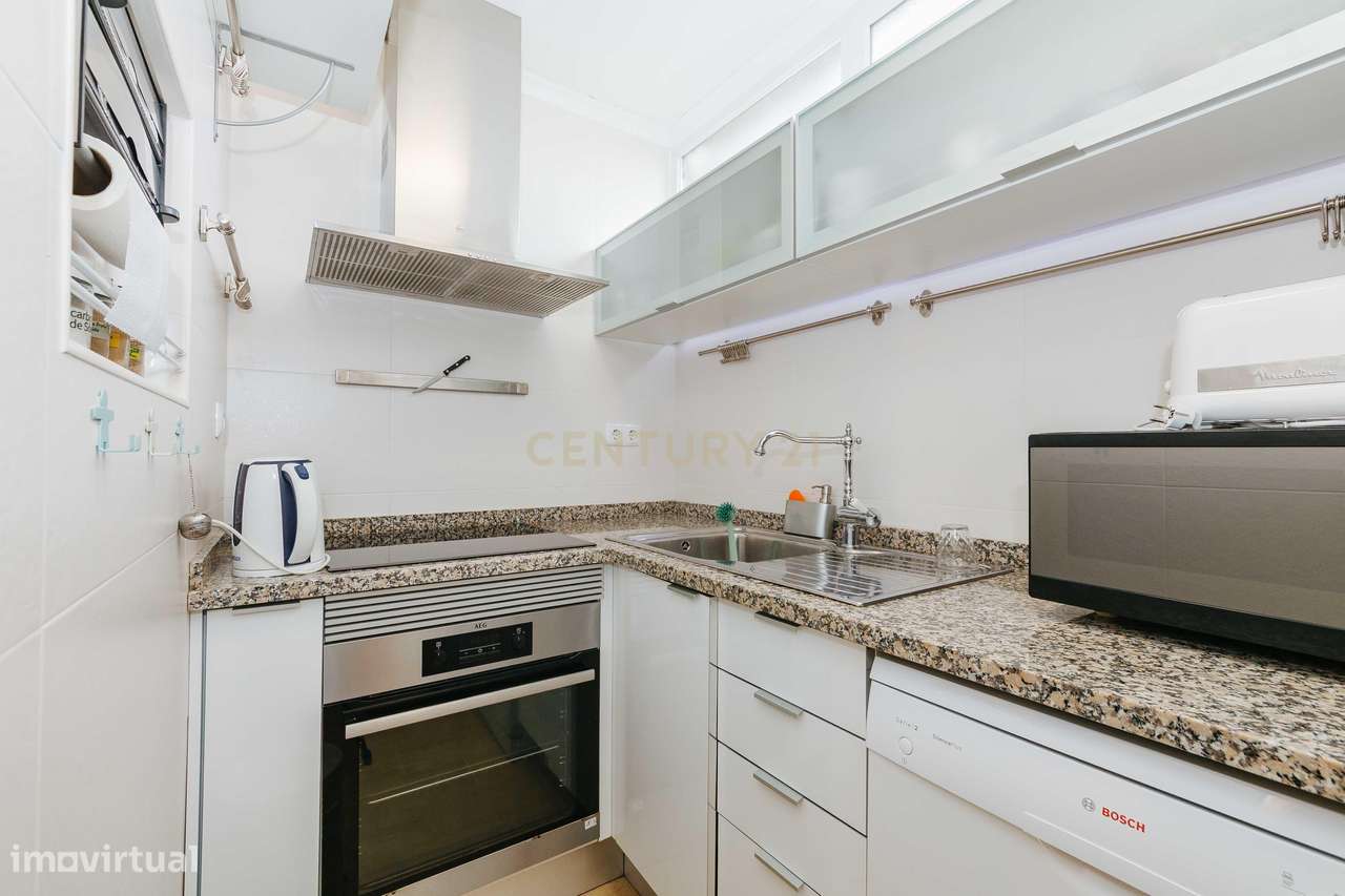 Moradia Renovada T1 em Lisboa com Pátio e Luz Natural - Grande imagem: 5/17