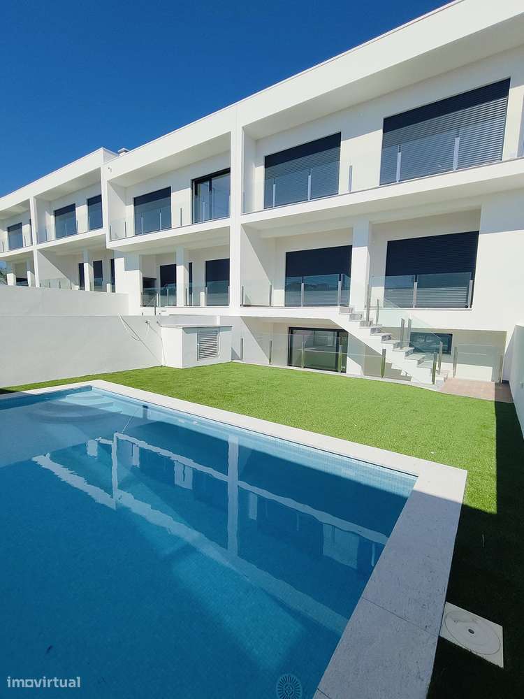 Oferta 1% do Valor de aquisição - Moradia em banda T4 com Piscina - Grande imagem: 5/60