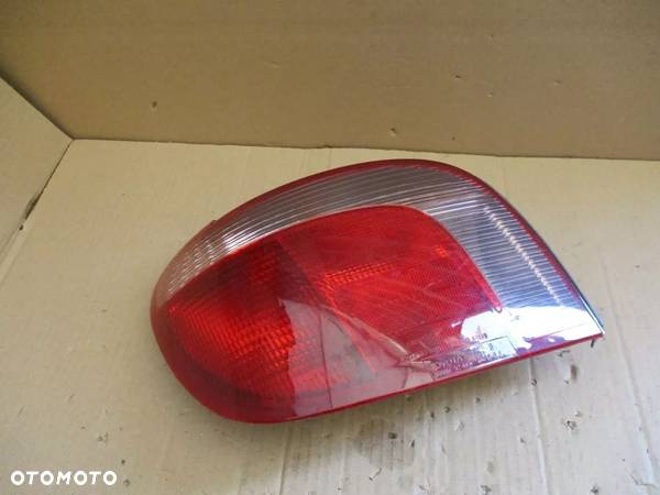 TOYOTA YARIS I 99- LAMPA TYŁ TYLNA LEWA - 1