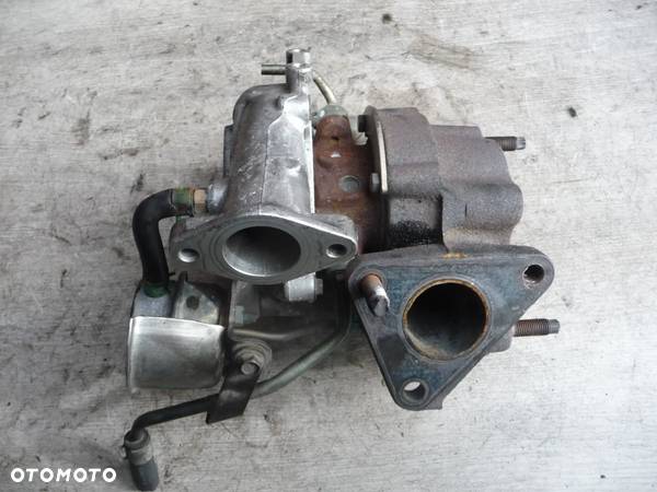 STAN BDB NISSAN ALMERA N16 ALMERA TINO 2.2TD TURBINA TURBOSPRĘŻARKA 144114U110 - 11