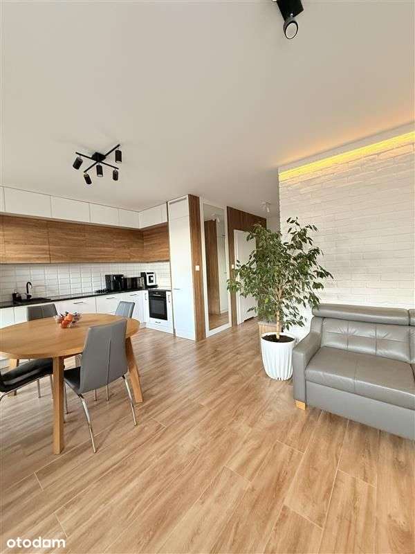 Komfortowe mieszkanie z ogródkiem-0