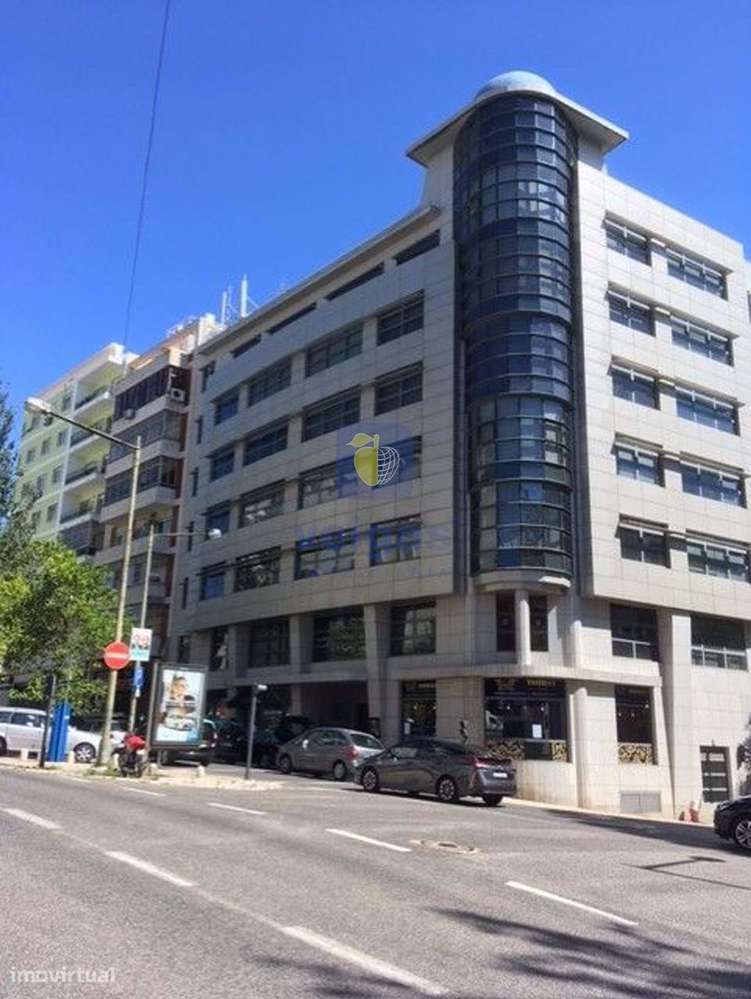 Escritório em open space, localizado na Av. Duque de Loulé, em edifíci - Grande imagem: 5/11