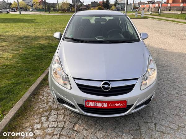 Opel Corsa 1.2 16V Enjoy - 23