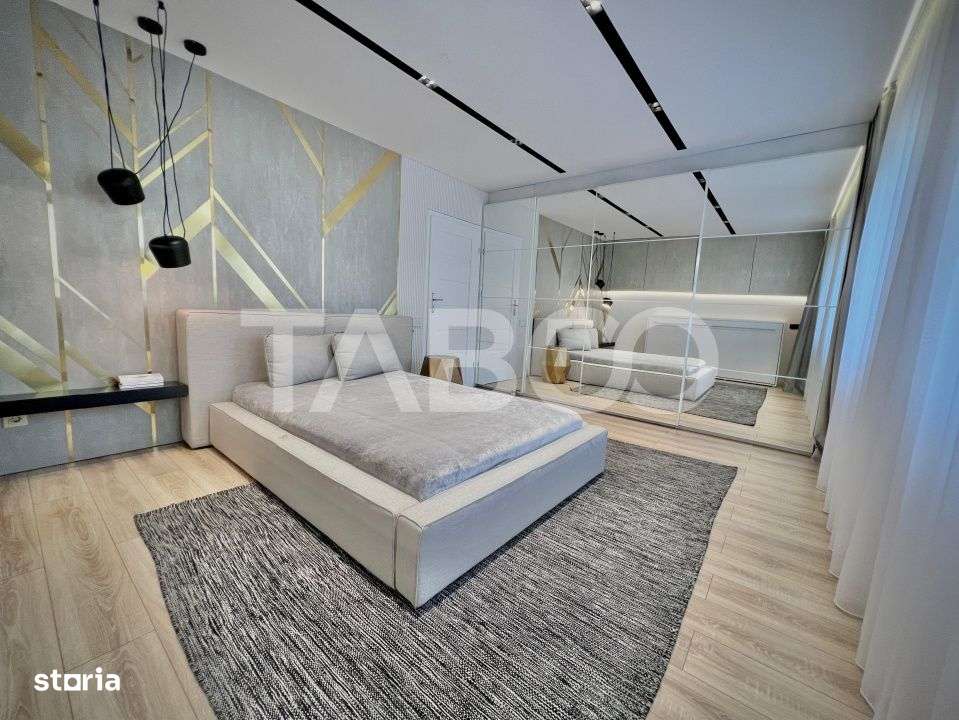 Apartament ultrafinisat cu 2 camere de vanzare si parcare Gheorgheni - Imagine principală: 5/8