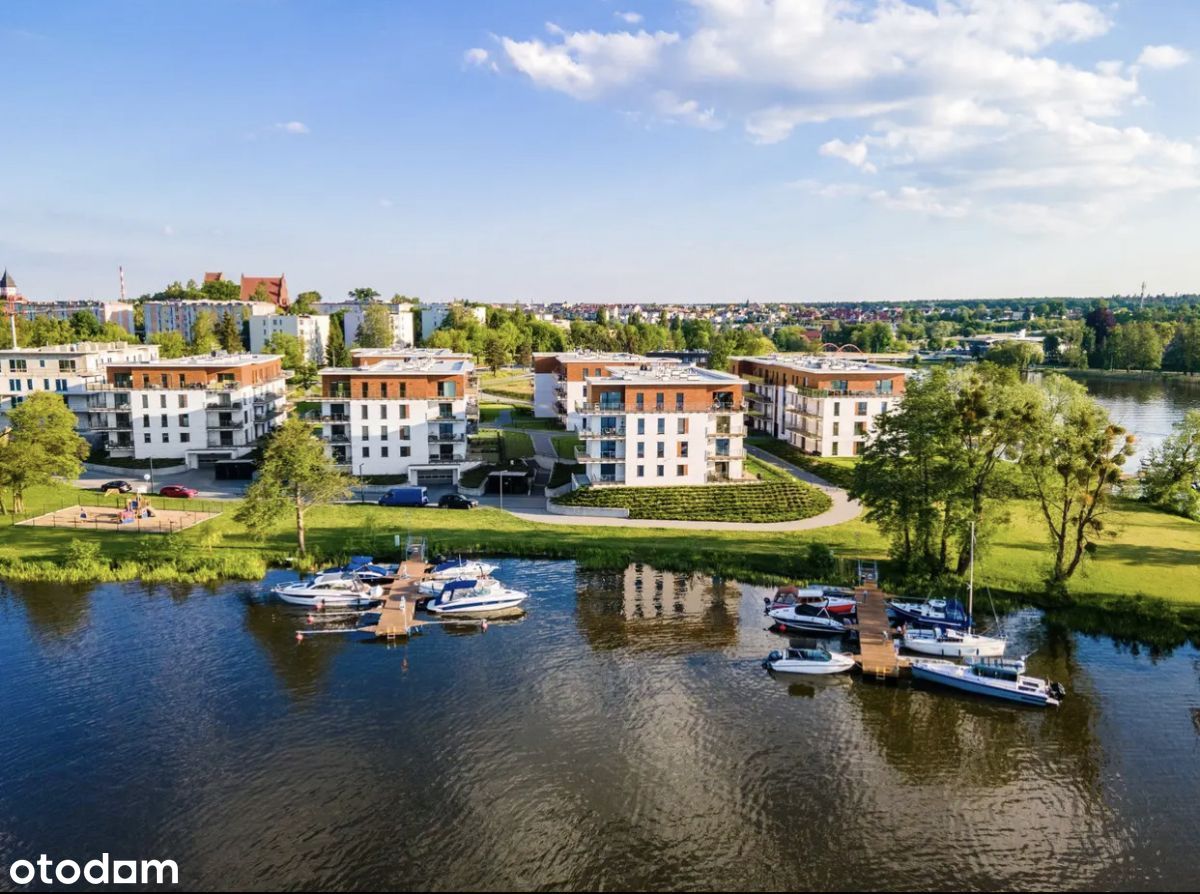 Apartament z ogródkiem, widokiem na jezioro Marina