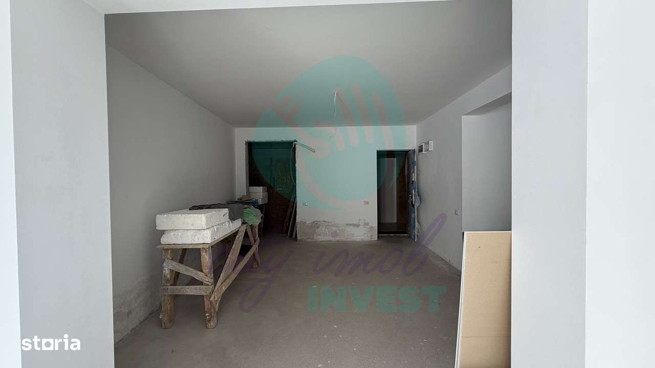 Apartament cu o curte generoasa de 60 mp - Imagine principală: 5/11