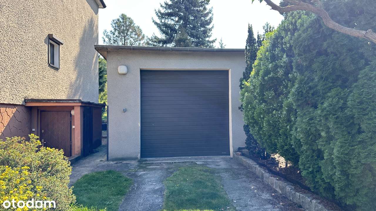 Pół bliźniaka 108 m kw z tarasem, pięknym ogrodem, piwnicą i garażem.-17