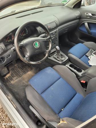 skoda superb fotel kanapa deska kokpit podsufitka boczek podłokietnik licznik panel - 1