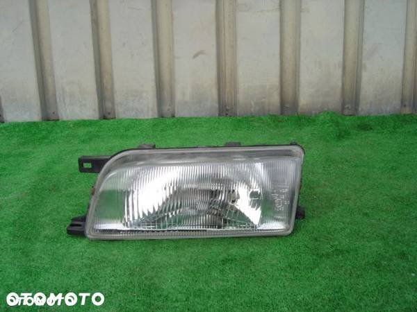 lampa lewa NISSAN ALMERA N15 96-98 oryginałSKOCZÓW - 1