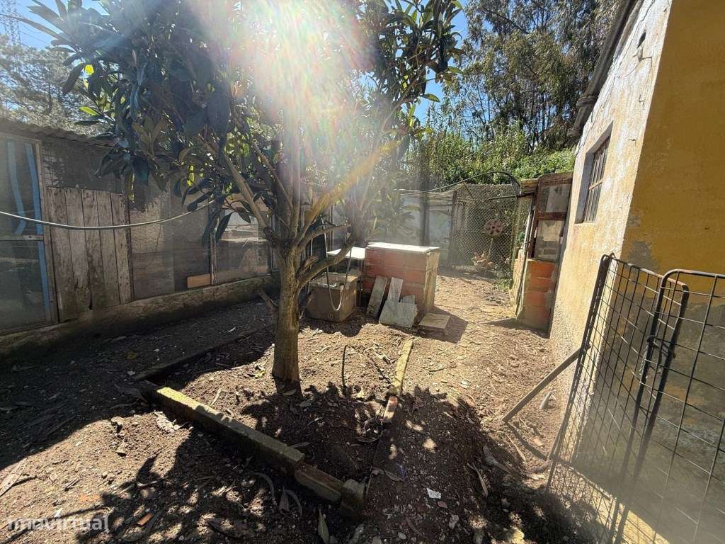 Terreno Urbano com 412m2 e pequena moradia edificada-11