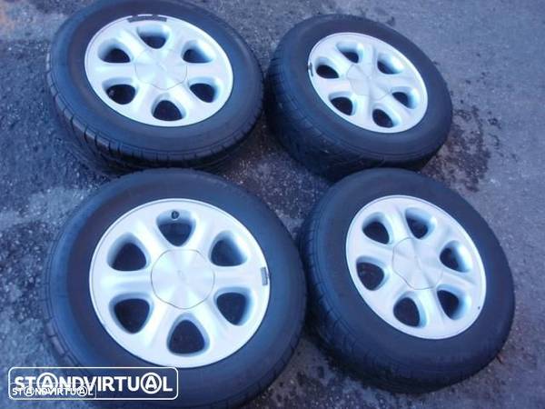 Jantes aluminio c/ pneus 195/65R15 - Provenientes de Ford Scorpio - 1