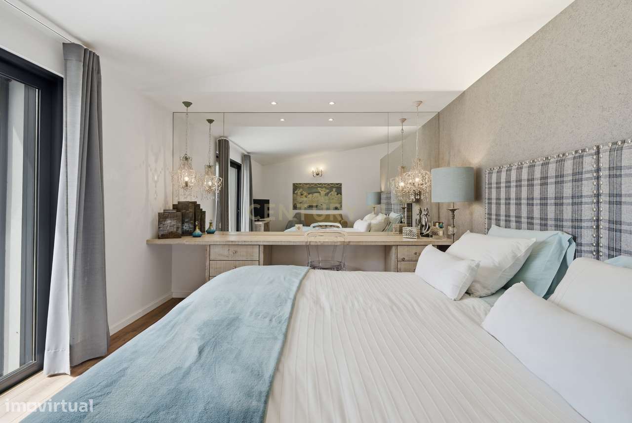 Quintinha T4 com edificação contemporânea no coração do Oeste, com ter-21