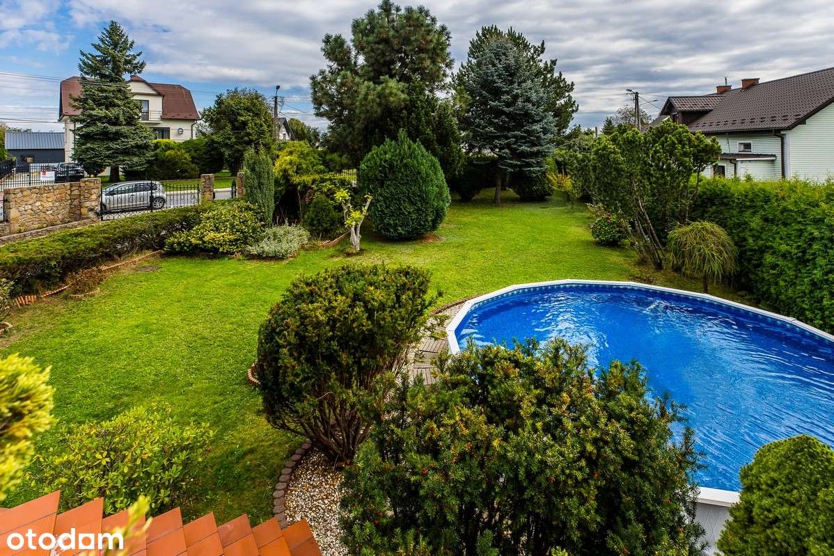 Dom wolnostojący z ogrodem i basenem w Mogilanach – 250 m²-1