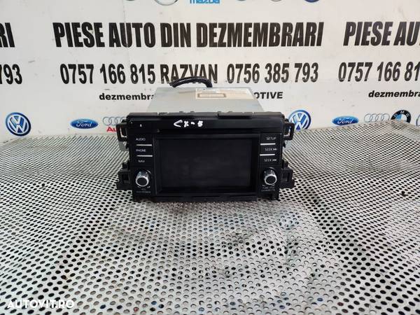 Unitate Radio Cd Navigatie Originala Mazda CX5 CX-5 An 2013-2014-2015-2016-2017 Testata Cu Garantie Dezmembrez Mazda CX5 2.2 Diesel Skyactive 4x4 An 2013-2014-2015-2016-2017 - Dezmembrari Arad - 1