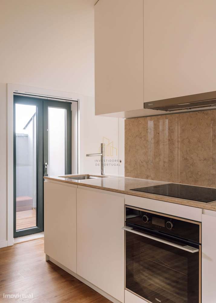 Apartamento T0 Moderno com Terraço na Calçada de Santo Amaro - Grande imagem: 4/8