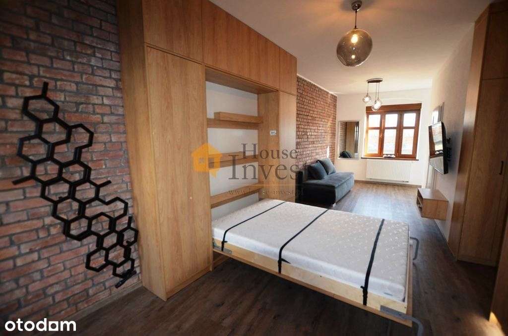 Gotowa inwestycja: 2 mieszkania, lokal, garaże - Pełny obrazek: 3/8