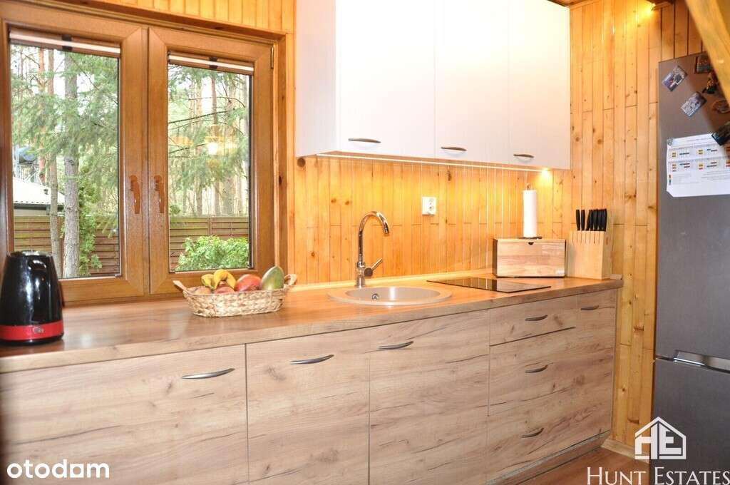 Działka w otoczeniu lasu z domem mieszkalnym i SPA-16