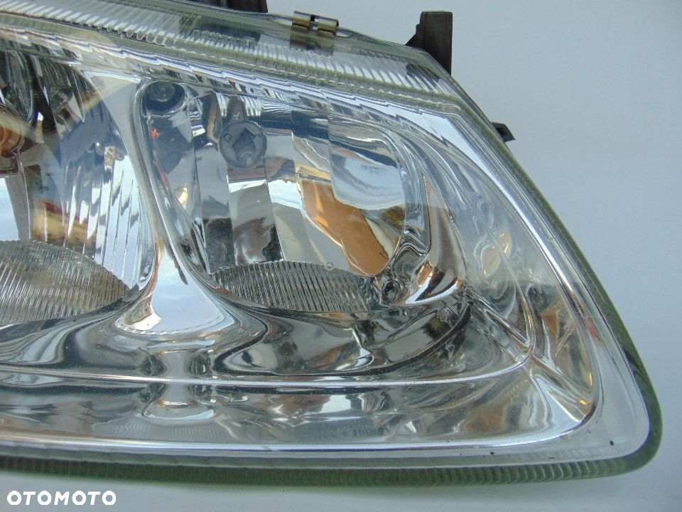 Oryginalna lampa przednia przód prawa Nissan Almera N16 00-03r Europa - 2