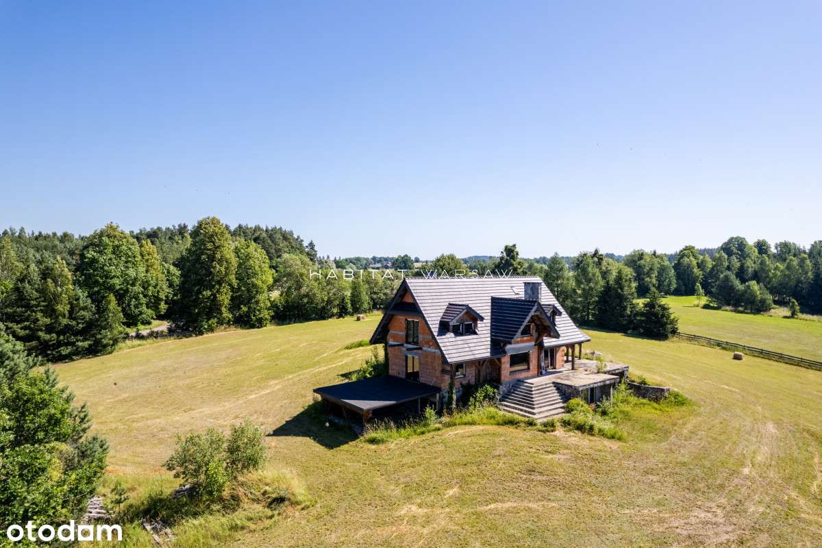 Dom z potencjałem w otoczeniu jeziora i lasu-17
