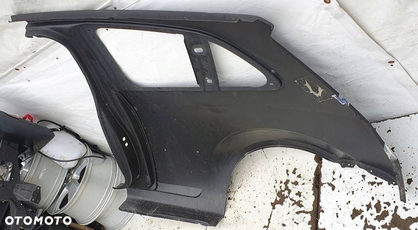 ĆWIARTKA BŁOTNIK PRAWY TYŁ FORD FIESTA MK6 02- ORG - 9