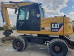 Caterpillar M313D - 1