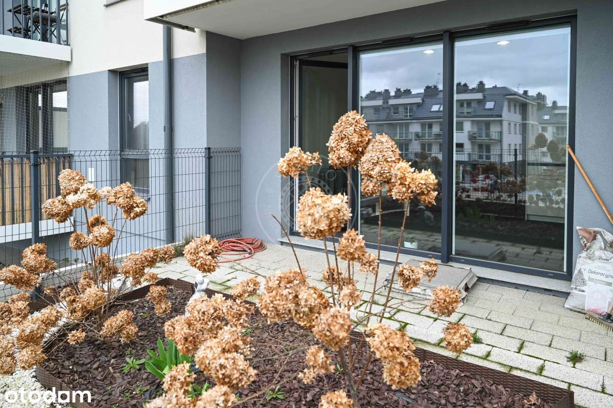 Kawalerka z ogródkiem + miejsce parkingowe!-11