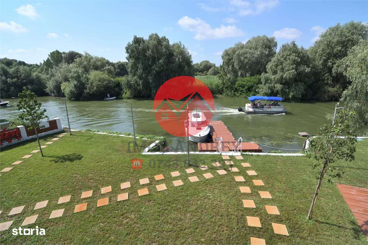 Pensiune moderna in Delta Dunarii, ponton si iaz privat pentru turism - Imagine principală: 2/19