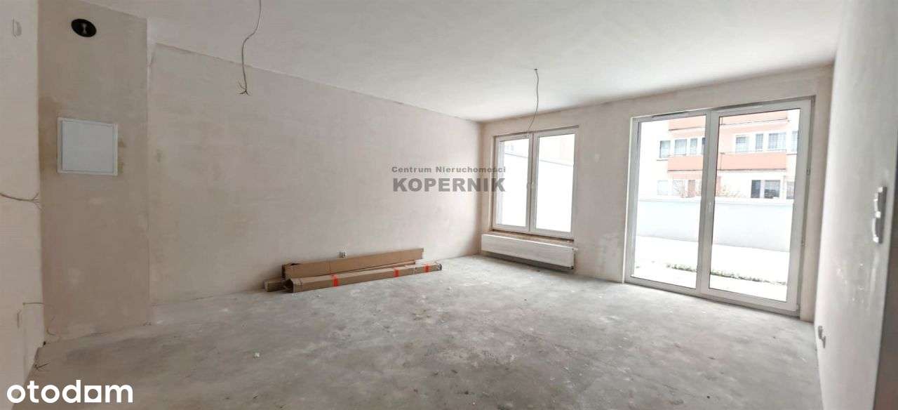 Dwa pokoje z dużym tarasem - deweloperka - Pełny obrazek: 1/7