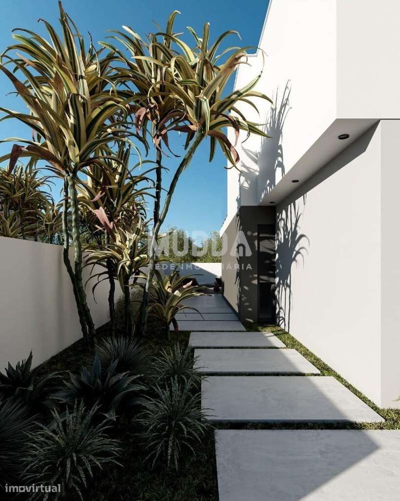 Moradia isolada de design contemporâneo nos Casais Mestre Mendo-10