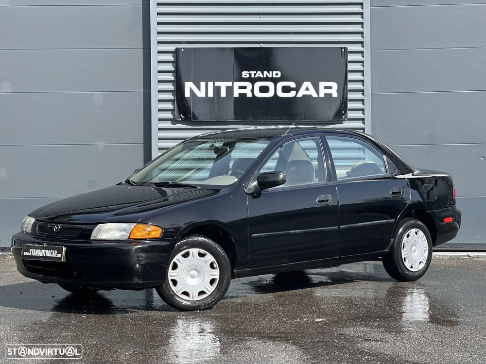 Neiman MAZDA 323 2 – Occasion, 1983, Essence, Noir, 12 Mois Garantie