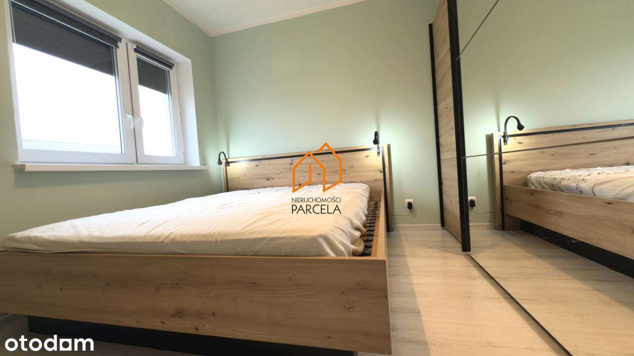 Mieszkanie dwupoziomowe z ogródkiem w Dominowie.-9