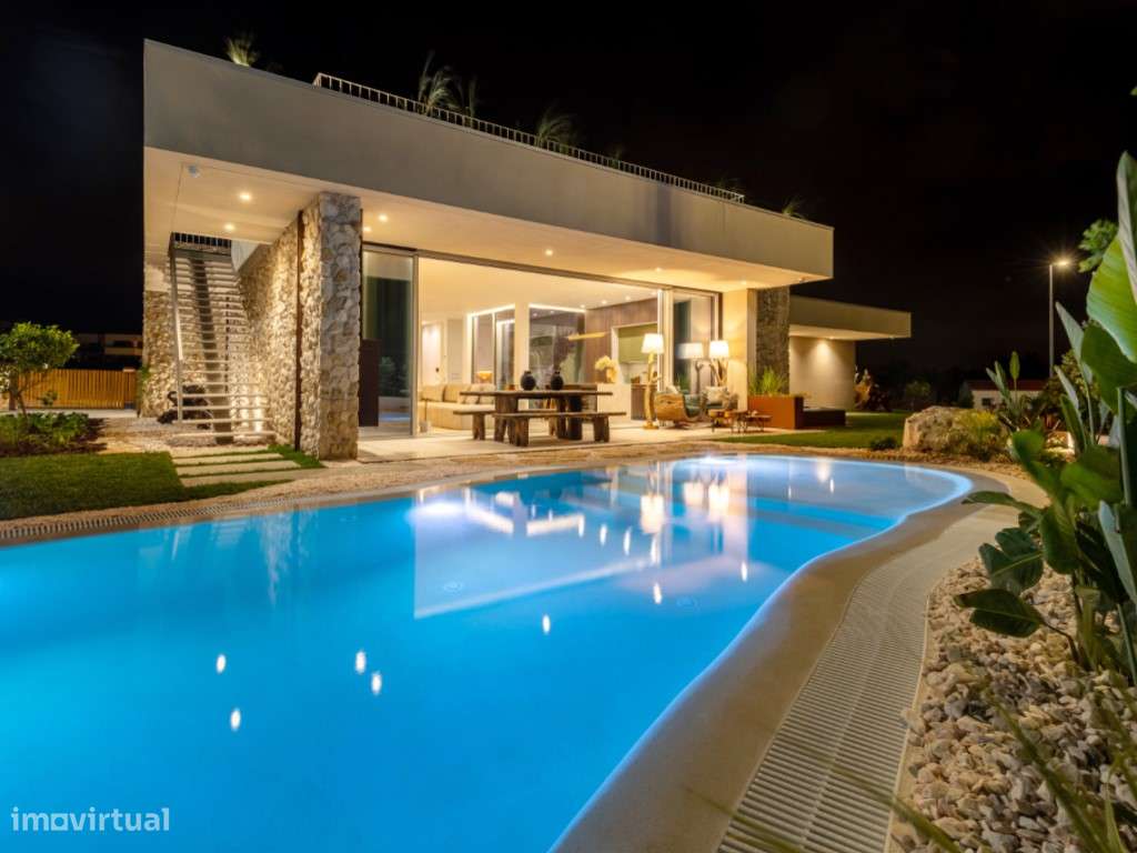 Moradia de extraordinária qualidade junto à lagoa, golfe e praia-44