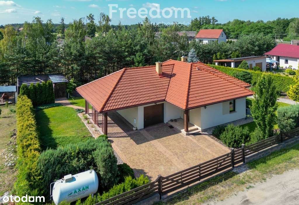 Parterowy dom z ogrodem i garażem 112,6 m²