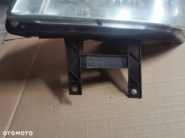 Lampa przednia lewa VW T5 7H1941015N Europa - 2