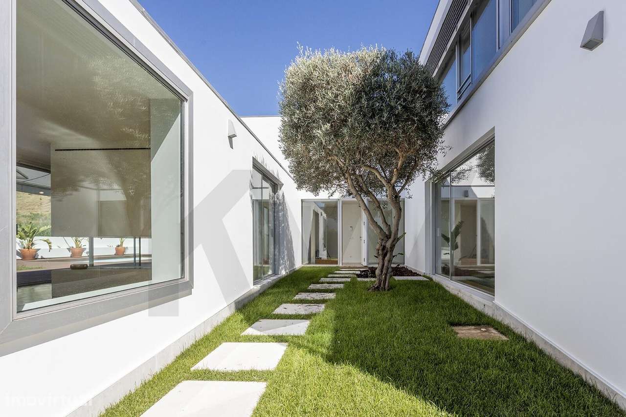 Exclusividade, luz e jardim em plena Lisboa - moradia premium na Quint - Grande imagem: 2/60